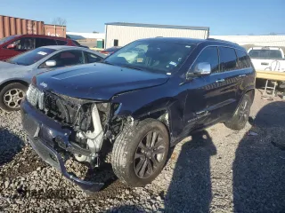 2017 Jeep Grand Cherokee Overland with VIN 1C4RJFCG1HC778818, listed as a Copart auction lot 87368764 with 62,471 mi miles and Salvage Title. Bid and sale history available at carsss.com. Image 1.