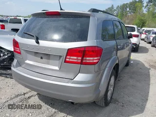 2017 Dodge Journey SE z VIN 3C4PDCAB0HT694918, wystawiony jako IAAI lot #42010594 z przebiegiem 135 432 mil mil oraz . Historia ofert i sprzedaży dostępna na DreamBid. Obrazek 4.