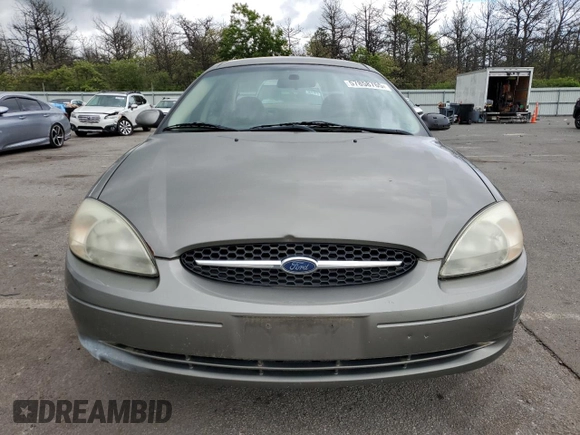 2002 Ford Taurus SE Standard z VIN 1FAFP53U92A246842, wystawiony jako Copart lot #57858765 z przebiegiem 64 545 mil mil oraz Czysty tytuł • Clean title. Historia ofert i sprzedaży dostępna na DreamBid. Obrazek 5.
