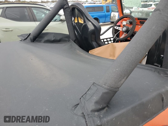 1984 Jeep CJ z VIN 1JCCM87E9ET003890, wystawiony jako Copart lot #78302994 z przebiegiem Nie podano mil oraz Szkoda całkowita • Salvage title. Historia ofert i sprzedaży dostępna na DreamBid. Obrazek 10.