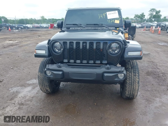 2023 Jeep Gladiator Overland with VIN 1C6JJTFM9PL593659, listed as a IAAI auction lot 42470253 with 34,374 mi miles and . Bid and sale history available at DreamBid. Image 11.