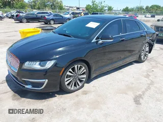 2018 Lincoln MKZ Reserve z VIN 3LN6L5E91JR602506, wystawiony jako IAAI lot #41976529 z przebiegiem 93 394 mil mil oraz . Historia ofert i sprzedaży dostępna na DreamBid. Obrazek 17.