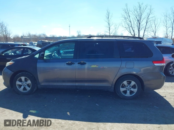 2011 Toyota Sienna with VIN 5TDZK3DC6BS125737, listed as a IAAI auction lot 41815233 with 248,318 mi miles. Bid and sale history available at carsss.com. Image 14.