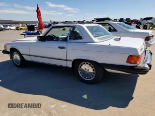 1987 Mercedes-Benz 560 SL with VIN WDBBA48D8HA068748, listed as a Copart auction lot 46874285 with 58,817 mi miles and Clean Title. Bid and sale history available at DreamBid. Image 2.