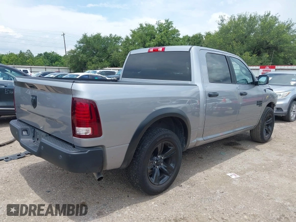 2024 Ram 1500 Warlock with VIN 1C6RR6LG2RS127561, listed as a IAAI auction lot 42472798 with 52,902 mi miles and . Bid and sale history available at DreamBid. Image 4.