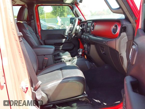 2023 Jeep Gladiator Rubicon z VIN 1C6JJTBG2PL509200, wystawiony jako IAAI lot #42537312 z przebiegiem Nie podano mil oraz . Historia ofert i sprzedaży dostępna na DreamBid. Obrazek 5.