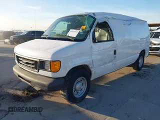 2005 Ford Econoline Cargo with VIN 1FTRE14W75HA20896, listed as a IAAI auction lot 41329375 with 80,828 mi miles. Bid and sale history available at carsss.com. Image 2.