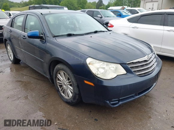 2007 Chrysler Sebring Touring z VIN 1C3LC56K37N644894, wystawiony jako IAAI lot #42326982 z przebiegiem 206 073 mil mil oraz . Historia ofert i sprzedaży dostępna na DreamBid. Obrazek 1.