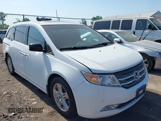 2011 Honda Odyssey Touring with VIN 5FNRL5H9XBB088963, listed as a IAAI auction lot 42561298 with 249,644 mi miles and . Bid and sale history available at DreamBid. Image 1.