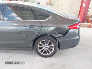 2019 Ford Fusion SE with VIN 3FA6P0HDXKR162353, listed as a IAAI auction lot 41970142 with 90,411 mi miles. Bid and sale history available at carsss.com. Image 6.