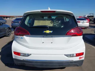 2017 Chevrolet Bolt EV LT z VIN 1G1FW6S05H4190464, wystawiony jako IAAI lot #41662766 z przebiegiem 62 954 mil mil oraz . Historia ofert i sprzedaży dostępna na DreamBid. Obrazek 16.