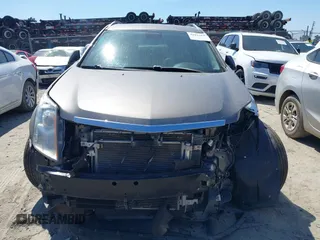 2012 Cadillac SRX Luxury Collection with VIN 3GYFNAE36CS509456, listed as a IAAI auction lot 41833647 with 119,931 mi miles and . Bid and sale history available at carsss.com. Image 13.