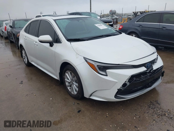 2024 Toyota Corolla Hybrid LE with VIN JTDBCMFE4RJ027221, listed as a IAAI auction lot 41084897 with 10,683 mi miles. Bid and sale history available at carsss.com. Image 1.