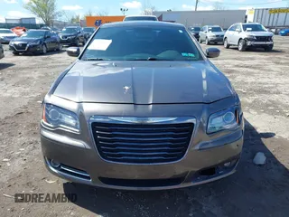 2014 Chrysler 300 with VIN 2C3CCABG4EH346967, listed as a IAAI auction lot 41985572 with 103,282 mi miles. Bid and sale history available at carsss.com. Image 11.
