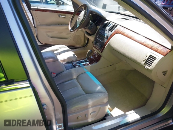2006 Cadillac DTS w/1SC with VIN 1G6KD57Y46U165978, listed as a IAAI auction lot 41854728 with 116,455 mi miles. Bid and sale history available at carsss.com. Image 5.