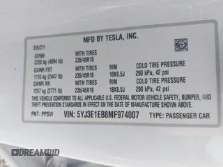 2021 Tesla Model 3 Long Range with VIN 5YJ3E1EB8MF974007, listed as a IAAI auction lot 41915513 with 107,354 mi miles and . Bid and sale history available at carsss.com. Image 9.