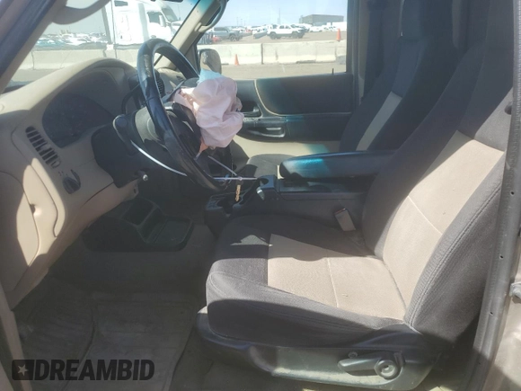 2005 Ford Ranger XLT with VIN 1FTZR45E95PA72435, listed as a Copart auction lot 52898275 with 204,545 mi miles and Salvage title. Bid and sale history available at DreamBid. Image 7.
