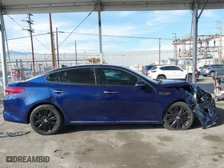 2018 Kia Optima SX with VIN 5XXGV4L29JG208284, listed as a IAAI auction lot 41765005 with 77,189 mi miles. Bid and sale history available at carsss.com. Image 14.