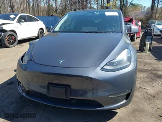 2023 Tesla Model Y Long Range with VIN 7SAYGDEEXPA175104, listed as a IAAI auction lot 41821928 with 52,791 mi miles. Bid and sale history available at carsss.com. Image 12.