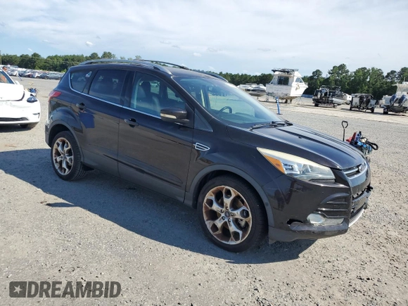 2013 Ford Escape Titanium z VIN 1FMCU0J93DUB60916, wystawiony jako Copart lot #61692595 z przebiegiem 169 691 mil mil oraz Szkoda całkowita • Salvage title. Historia ofert i sprzedaży dostępna na DreamBid. Obrazek 4.