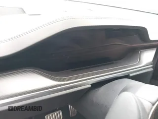 2022 Tesla Model X Plaid z VIN 7SAXCBE67NF339557, wystawiony jako IAAI lot #41825360 z przebiegiem 70 mil mil oraz . Historia ofert i sprzedaży dostępna na DreamBid. Obrazek 7.