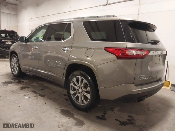 2018 Chevrolet Traverse Premier with VIN 1GNEVJKW0JJ165144, listed as a IAAI auction lot 41129951 with 137,593 mi miles. Bid and sale history available at carsss.com. Image 3.