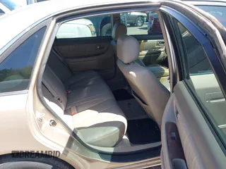 2002 Toyota Avalon XL with VIN 4T1BF28B62U261312, listed as a IAAI auction lot 41957062 with 233,443 mi miles. Bid and sale history available at carsss.com. Image 8.