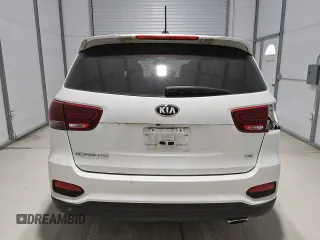 2019 Kia Sorento LX z VIN 5XYPG4A54KG482528, wystawiony jako Copart lot #55098735 z przebiegiem 128 821 mil mil oraz Czysty tytuł • Clean title. Historia ofert i sprzedaży dostępna na DreamBid. Obrazek 6.
