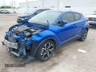 2020 Toyota C-HR LE with VIN JTNKHMBX7L1077218, listed as a IAAI auction lot 41994809 with 69,441 mi miles and . Bid and sale history available at DreamBid. Image 2.