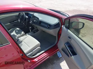 2010 Honda Insight EX with VIN JHMZE2H73AS009253, listed as a IAAI auction lot 41882569 with 104,839 mi miles and . Bid and sale history available at DreamBid. Image 5.