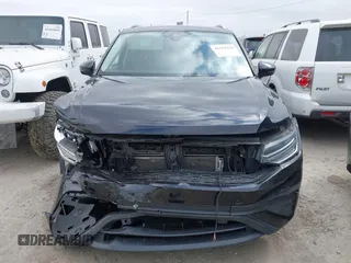 2022 Volkswagen Tiguan SE with VIN 3VV3B7AX3NM016534, listed as a IAAI auction lot 42354264 with 33,700 mi miles and . Bid and sale history available at DreamBid. Image 12.