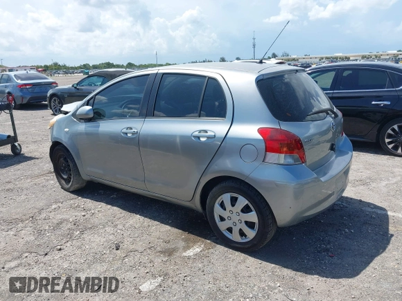 2010 Toyota Yaris with VIN JTDKT4K31A5318793, listed as a IAAI auction lot 39910045 with 192,737 mi miles. Bid and sale history available at carsss.com. Image 3.