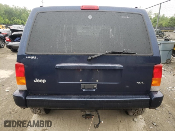 1997 Jeep Cherokee Country with VIN 1J4FJ78S4VL589852, listed as a Copart auction lot 56294015 with 189,530 mi miles and Salvage title. Bid and sale history available at DreamBid. Image 6.