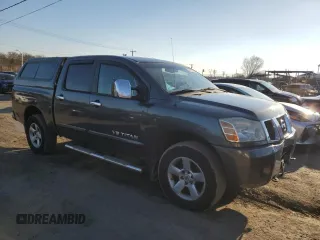 2005 Nissan Titan SE with VIN 1N6BA07BX5N557633, listed as a Copart auction lot 45197365 with 214,516 mi miles and Clean Title. Bid and sale history available at DreamBid. Image 4.