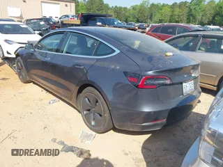 2019 Tesla Model 3 Long Range with VIN 5YJ3E1EB2KF510398, listed as a IAAI auction lot 42067654 with 108,971 mi miles and . Bid and sale history available at DreamBid. Image 3.