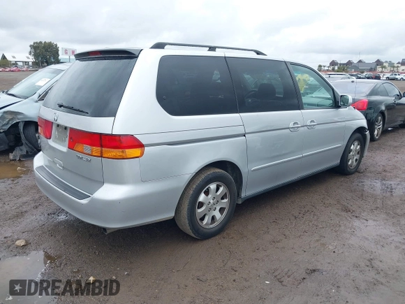 2003 Honda Odyssey EX-L z VIN 5FNRL18033B096575, wystawiony jako IAAI lot #41576926 z przebiegiem 210 932 mil mil oraz . Historia ofert i sprzedaży dostępna na DreamBid. Obrazek 4.
