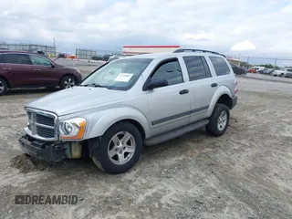 2005 Dodge Durango SXT with VIN 1D4HD38N95F506717, listed as a IAAI auction lot 41737887 with 272,149 mi miles and . Bid and sale history available at DreamBid. Image 2.