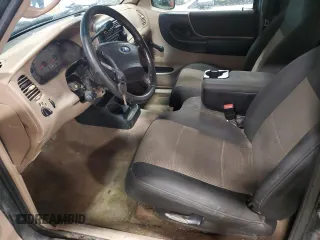 2003 Ford Ranger with VIN 1FT2R45E13TH19779, listed as a Copart auction lot 53247264 with 164,185 mi miles and Clean Title. Bid and sale history available at DreamBid. Image 7.