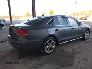 2014 Volkswagen Passat SE z VIN 1VWBN7A32EC059503, wystawiony jako IAAI lot #40876045 z przebiegiem Nie podano mil oraz . Historia ofert i sprzedaży dostępna na DreamBid. Obrazek 4.