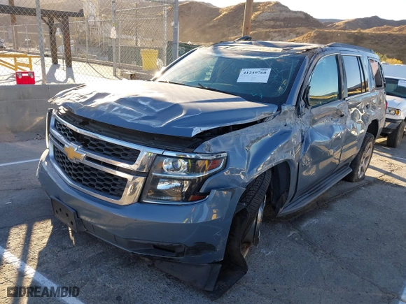 2016 Chevrolet Tahoe LS with VIN 1GNSCAKC0GR413515, listed as a IAAI auction lot 41249760 with 163,107 mi miles. Bid and sale history available at carsss.com. Image 2.
