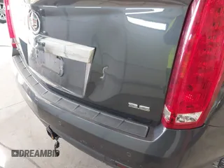 2012 Cadillac SRX Luxury Collection with VIN 3GYFNDE38CS654886, listed as a IAAI auction lot 41758399 with 210,680 mi miles. Bid and sale history available at carsss.com. Image 6.