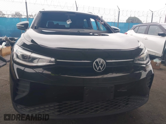 2021 Volkswagen ID.4 Pro S z VIN WVGTMPE26MP065481, wystawiony jako IAAI lot #41719800 z przebiegiem Nie podano mil oraz . Historia ofert i sprzedaży dostępna na DreamBid. Obrazek 13.