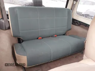 1999 Jeep Wrangler Sahara with VIN 1J4FY49S5XP482037, listed as a IAAI auction lot 42341723 with 161,081 mi miles and . Bid and sale history available at DreamBid. Image 8.