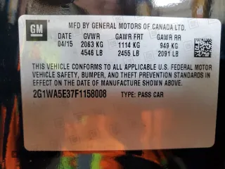2015 Chevrolet Impala LS with VIN 2G1WA5E37F1158008, listed as a Copart auction lot 61977635 with 106,437 mi miles and Salvage title. Bid and sale history available at DreamBid. Image 12.