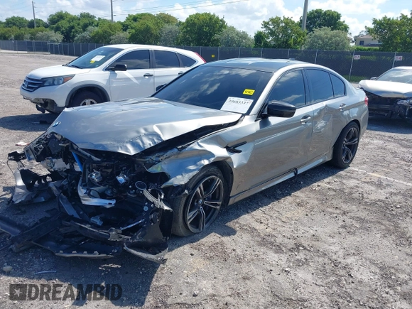 2019 BMW M5 Competition z VIN WBSJF0C50KB285924, wystawiony jako IAAI lot #41686677 z przebiegiem 44 238 mil mil oraz . Historia ofert i sprzedaży dostępna na DreamBid. Obrazek 2.
