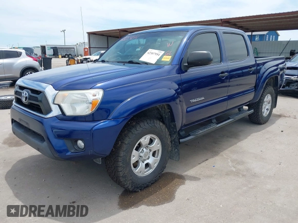 2014 Toyota Tacoma with VIN 3TMLU4EN6EM148851, listed as a IAAI auction lot 42307954 with 71,784 mi miles and . Bid and sale history available at DreamBid. Image 2.