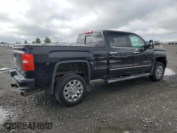 2017 GMC Sierra 2500HD Denali z VIN 1GT12UEY0HF114366, wystawiony jako Copart lot #54540275 z przebiegiem 78 066 mil mil oraz Szkoda całkowita • Salvage title. Historia ofert i sprzedaży dostępna na DreamBid. Obrazek 3.