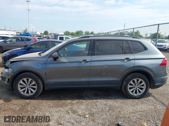 2018 Volkswagen Tiguan S with VIN 3VV0B7AX5JM108306, listed as a IAAI auction lot 42741783 with 71,040 mi miles and . Bid and sale history available at DreamBid. Image 14.