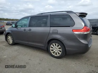 2012 Toyota Sienna XLE with VIN 5TDDK3DC2CS038316, listed as a Copart auction lot 52694245 with 273,415 mi miles and Clean Title. Bid and sale history available at DreamBid. Image 2.
