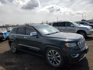 2017 Jeep Grand Cherokee Overland z VIN 1C4RJFCG7HC727517, wystawiony jako Copart lot #51658665 z przebiegiem 170 184 mil mil oraz Czysty tytuł • Clean title. Historia ofert i sprzedaży dostępna na DreamBid. Obrazek 4.